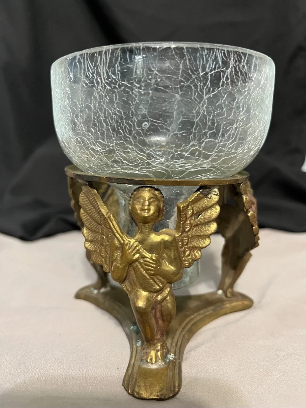 Pair of vintage brass and crackle glass cherub candle holder.